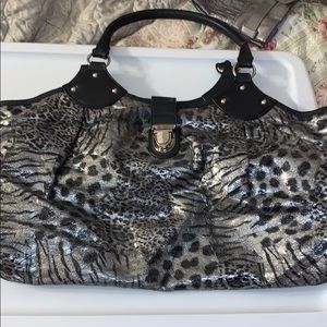 Black and grey cheetah print purse